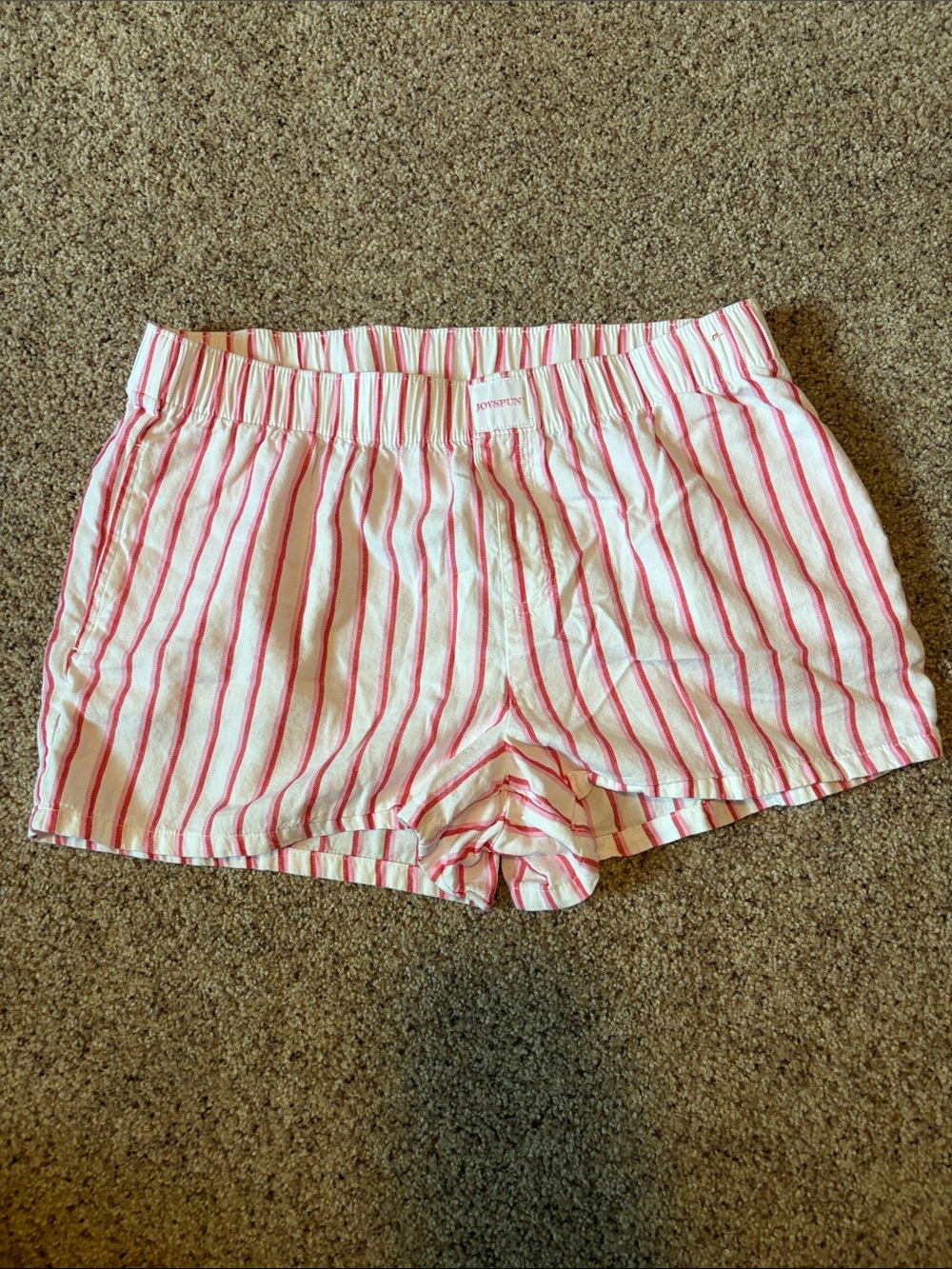 Pink and white striped shorts
